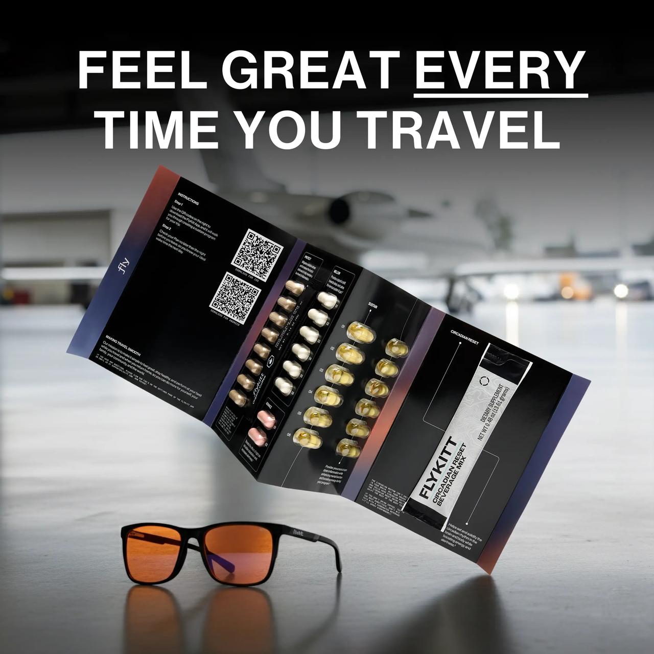Flykitt International kit with "FEEL GREAT EVERY TIME YOU TRAVEL" purple gradient branding and black supplement bottle on wooden table